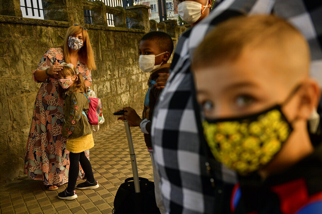 APTOPIX Virus Outbreak Spain School Year